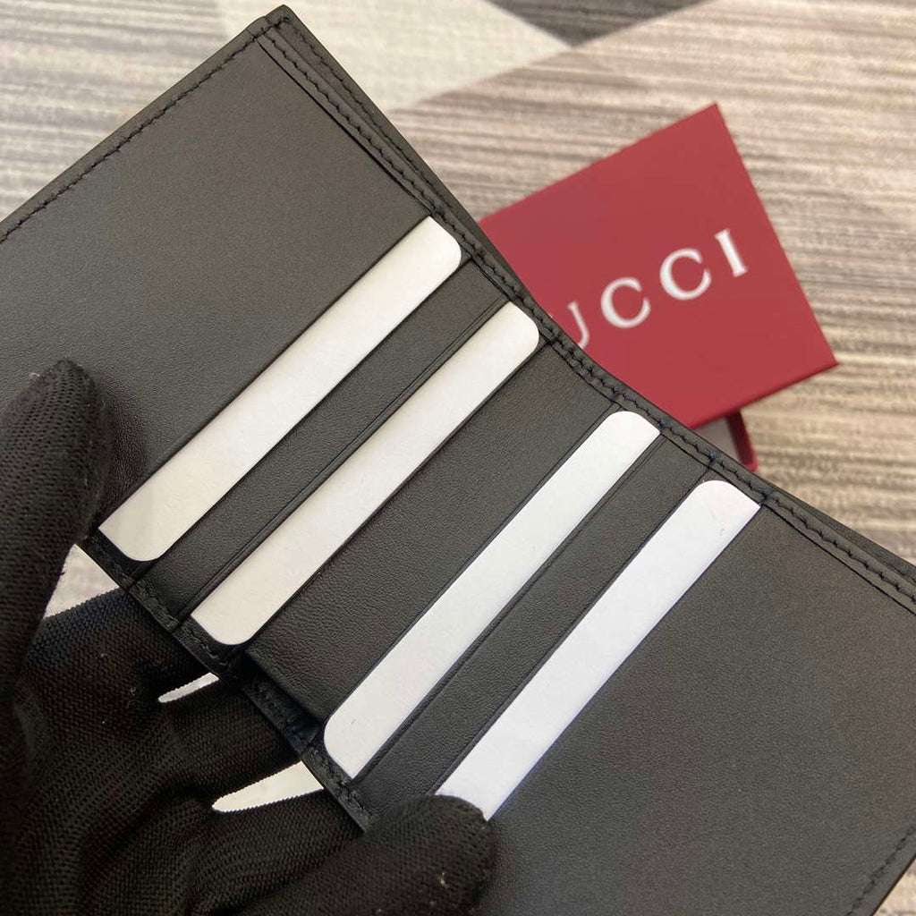 Gucci 821206 GG Emblem bi-fold wallet Black