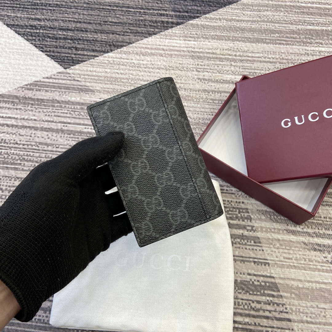 Gucci 821209 GG Emblem bi-fold card case Black