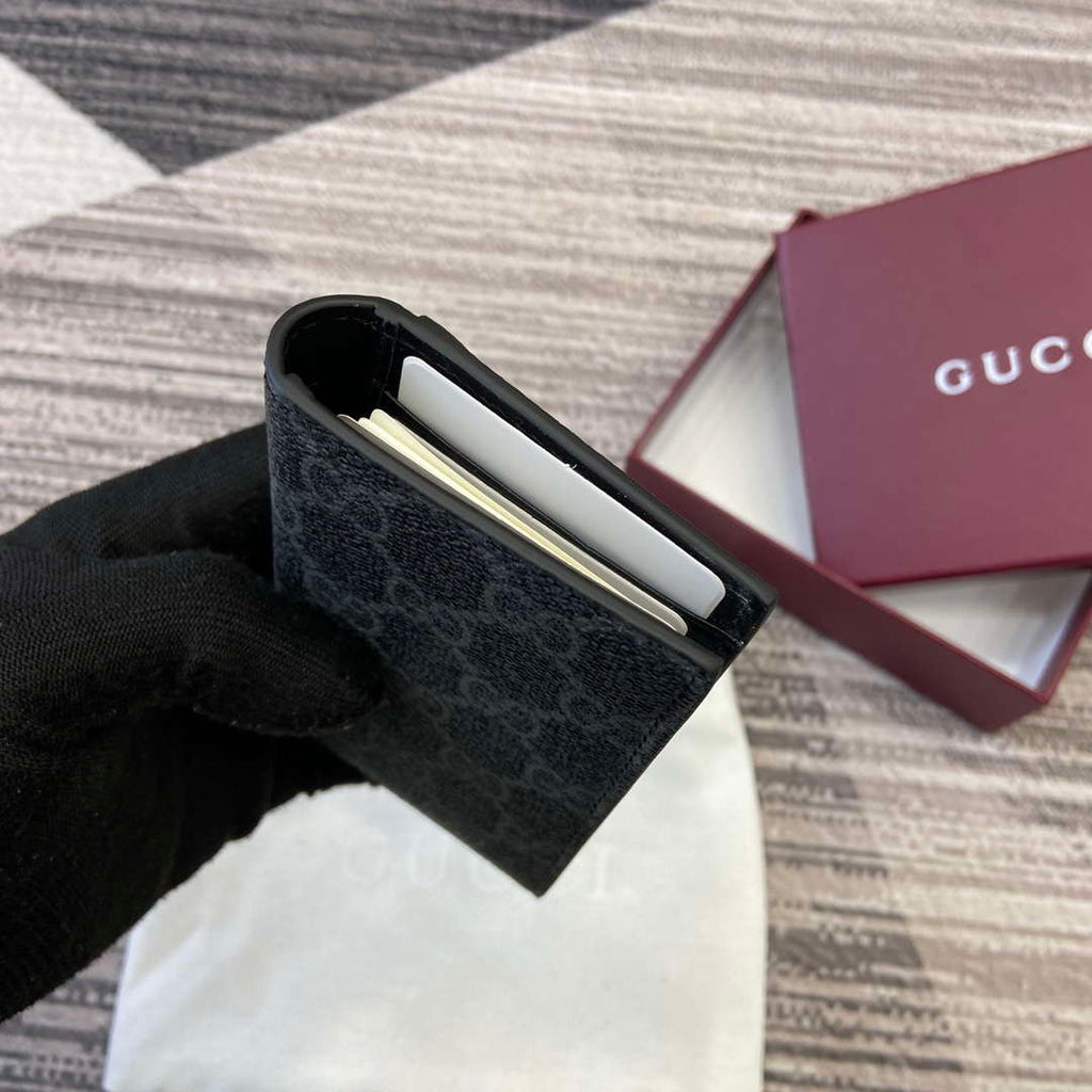 Gucci 821209 GG Emblem bi-fold card case Black