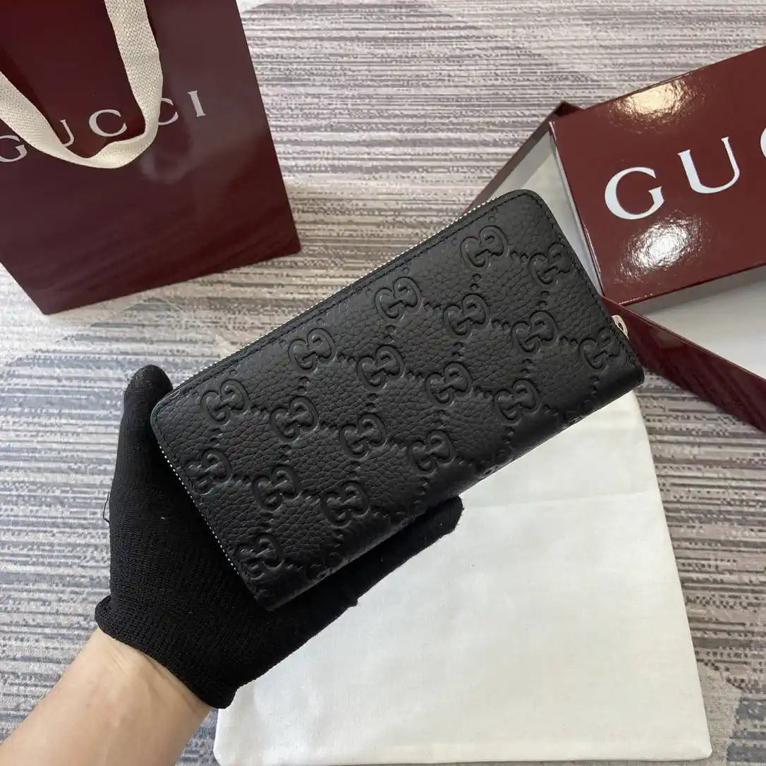 Gucci 835003 Gucci Imprint zip around wallet Black