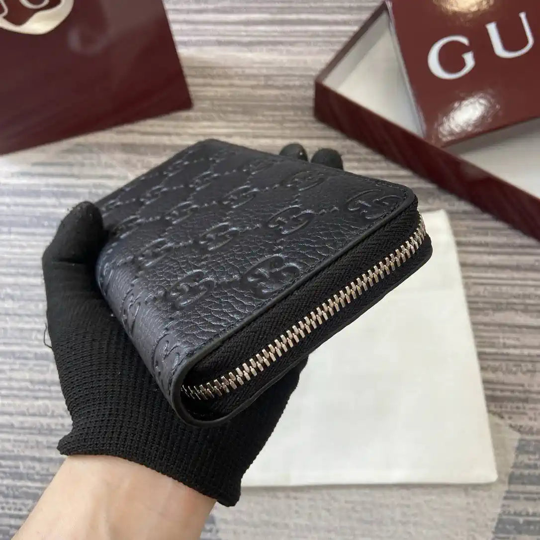 Gucci 835003 Gucci Imprint zip around wallet Black
