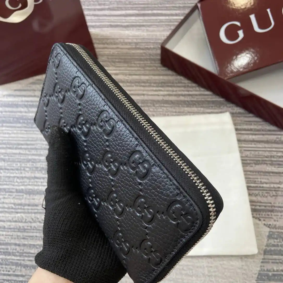 Gucci 835003 Gucci Imprint zip around wallet Black