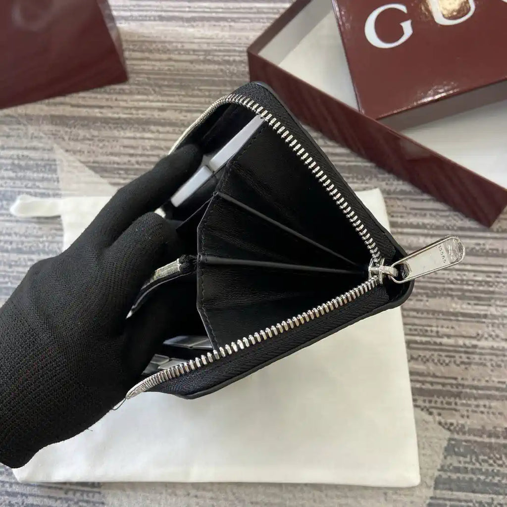 Gucci 835003 Gucci Imprint zip around wallet Black