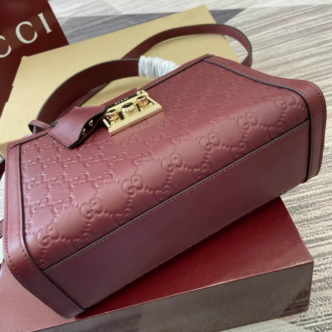 Gucci 838992 Padlock medium top handle bag  Red GG leather