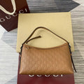 Gucci 847449 GG Emblem medium shoulder bag Brown