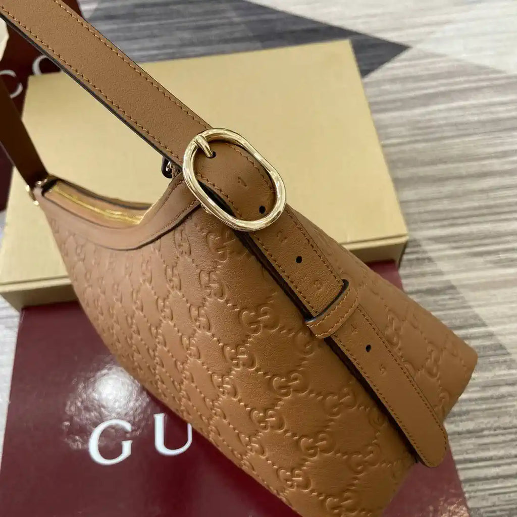 Gucci 847449 GG Emblem medium shoulder bag Brown