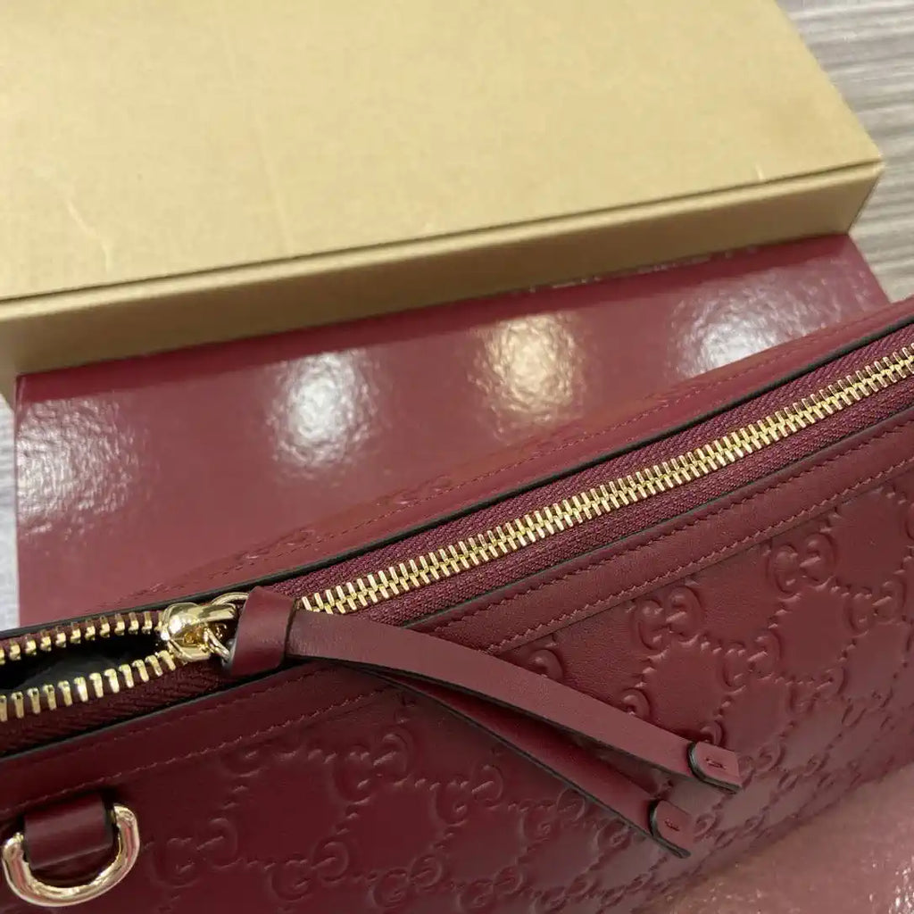 Gucci 847449 GG Emblem medium shoulder bag Rose Red
