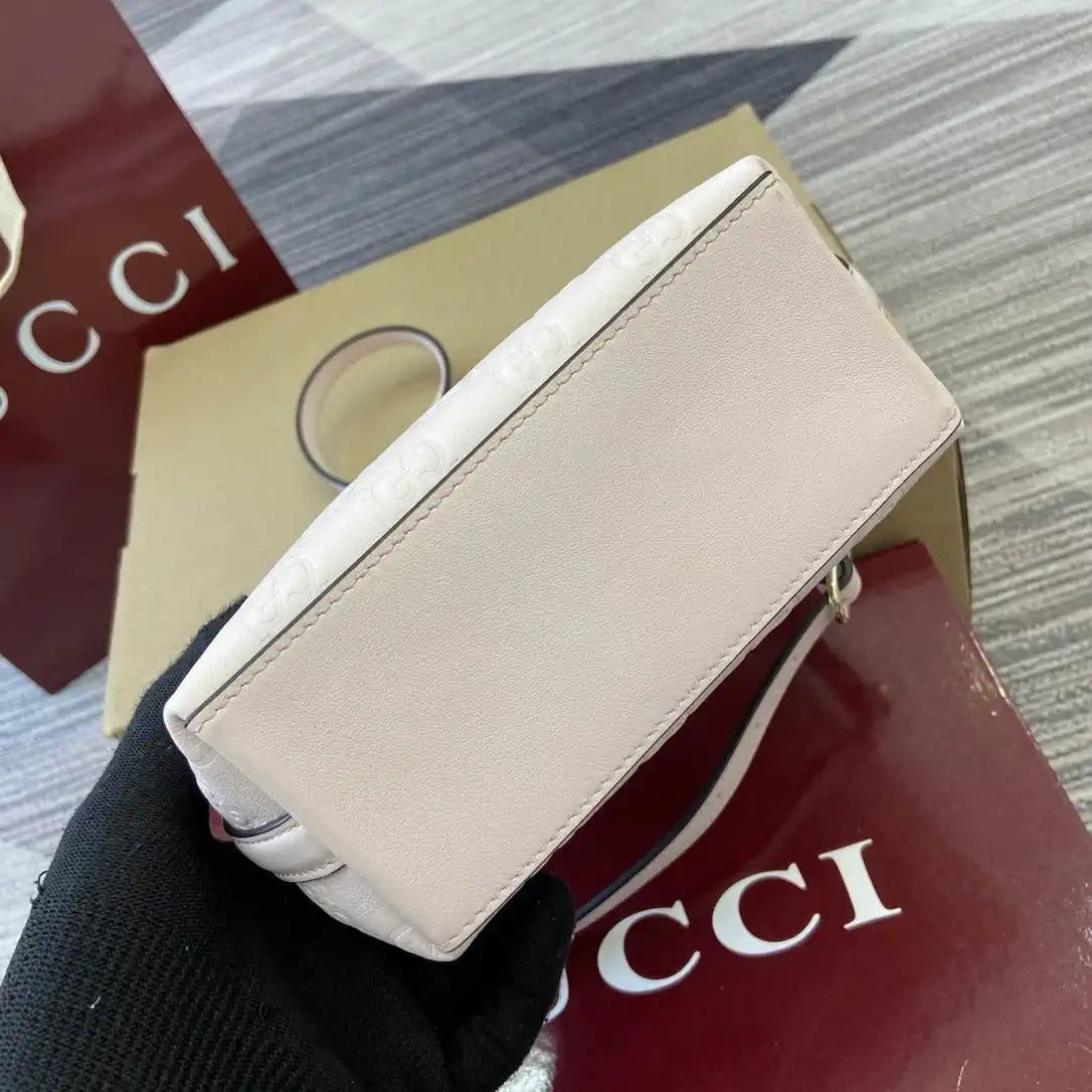 Gucci GG Emblem nano bucket bag 847090 Light Pink GG Leather