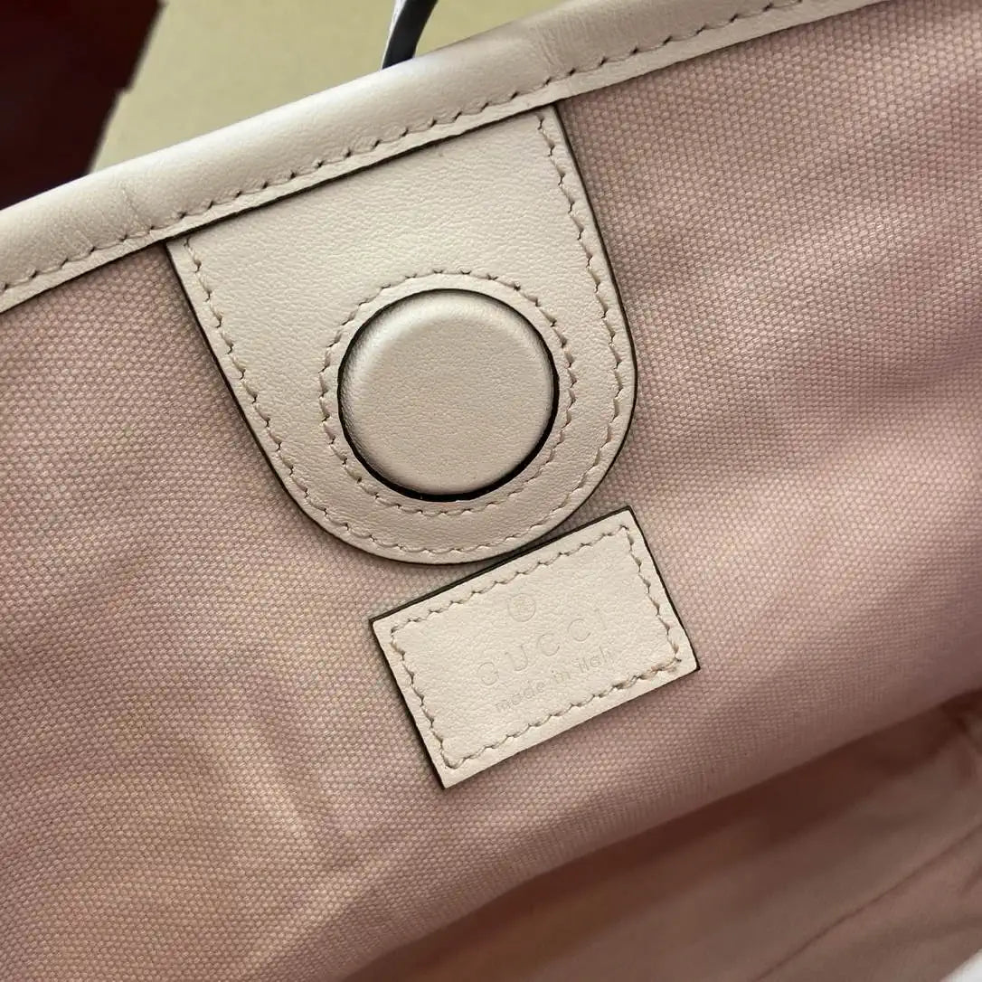 Gucci GG Emblem nano bucket bag 847090 Light Pink GG Leather