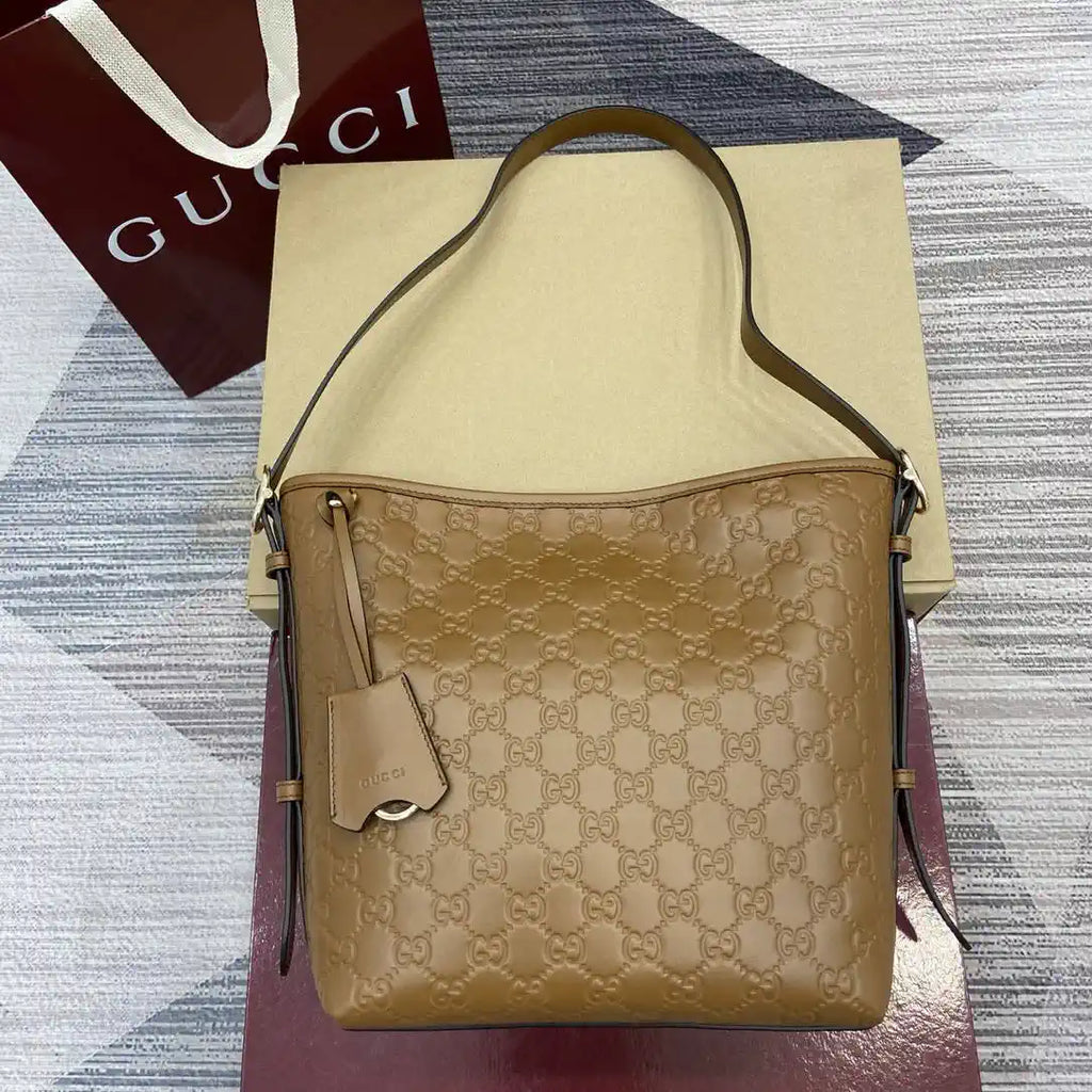 Gucci GG Emblem small shoulder bag 848881 Brown
