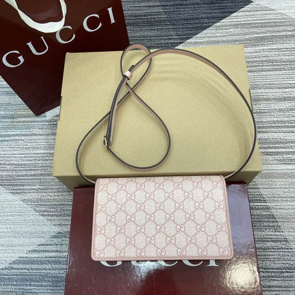 Gucci GG Emblem wallet with leather strap 820688 Biege & Pink