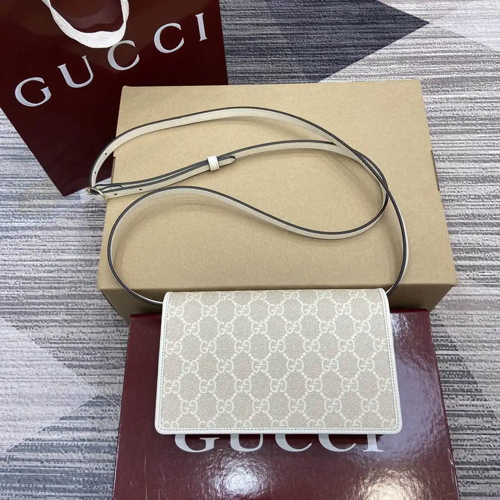 Gucci GG Emblem wallet with leather strap 820688 Biege & White