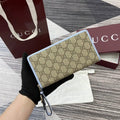 Gucci GG Emblem zip around wallet 819122 light blue