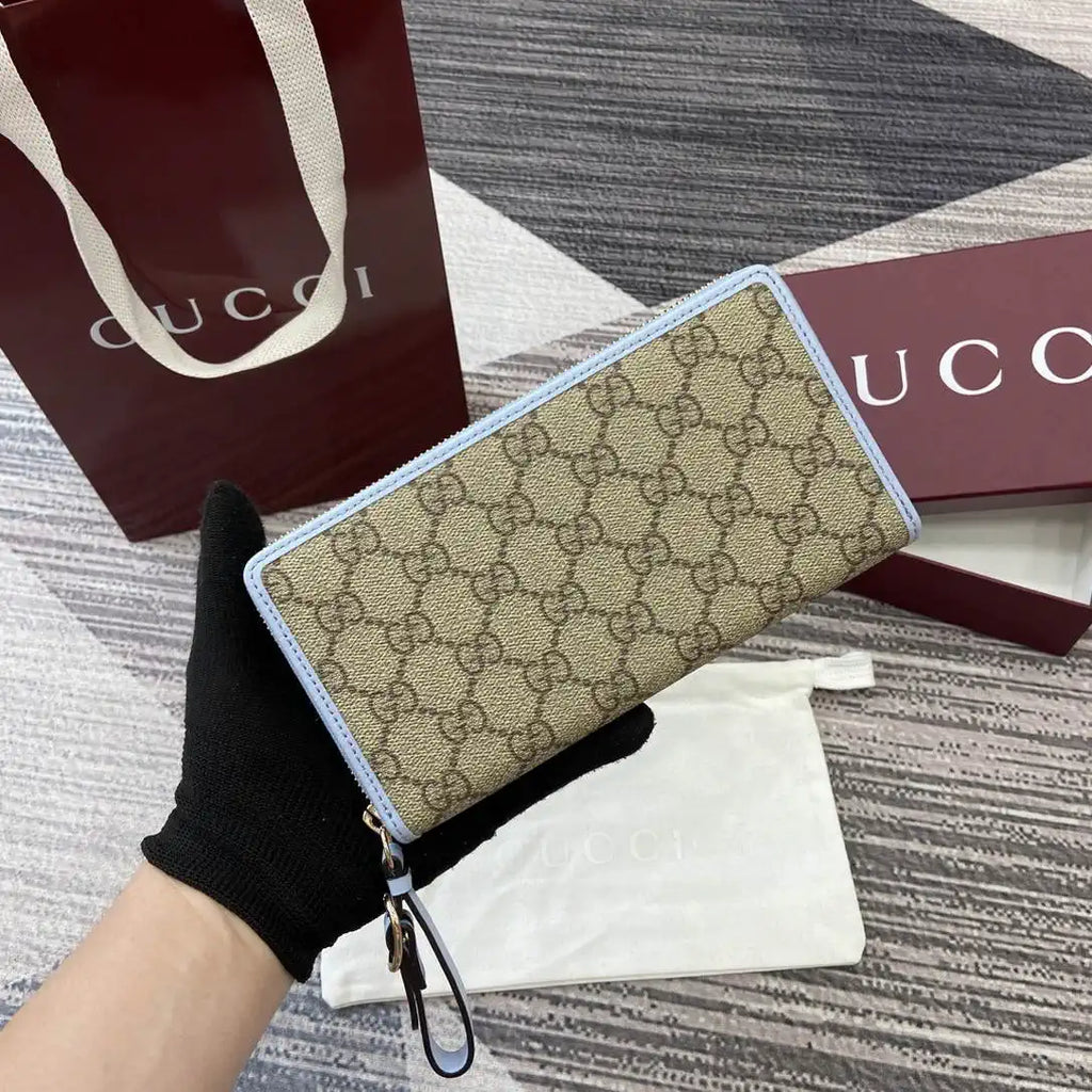 Gucci GG Emblem zip around wallet 819122 light blue