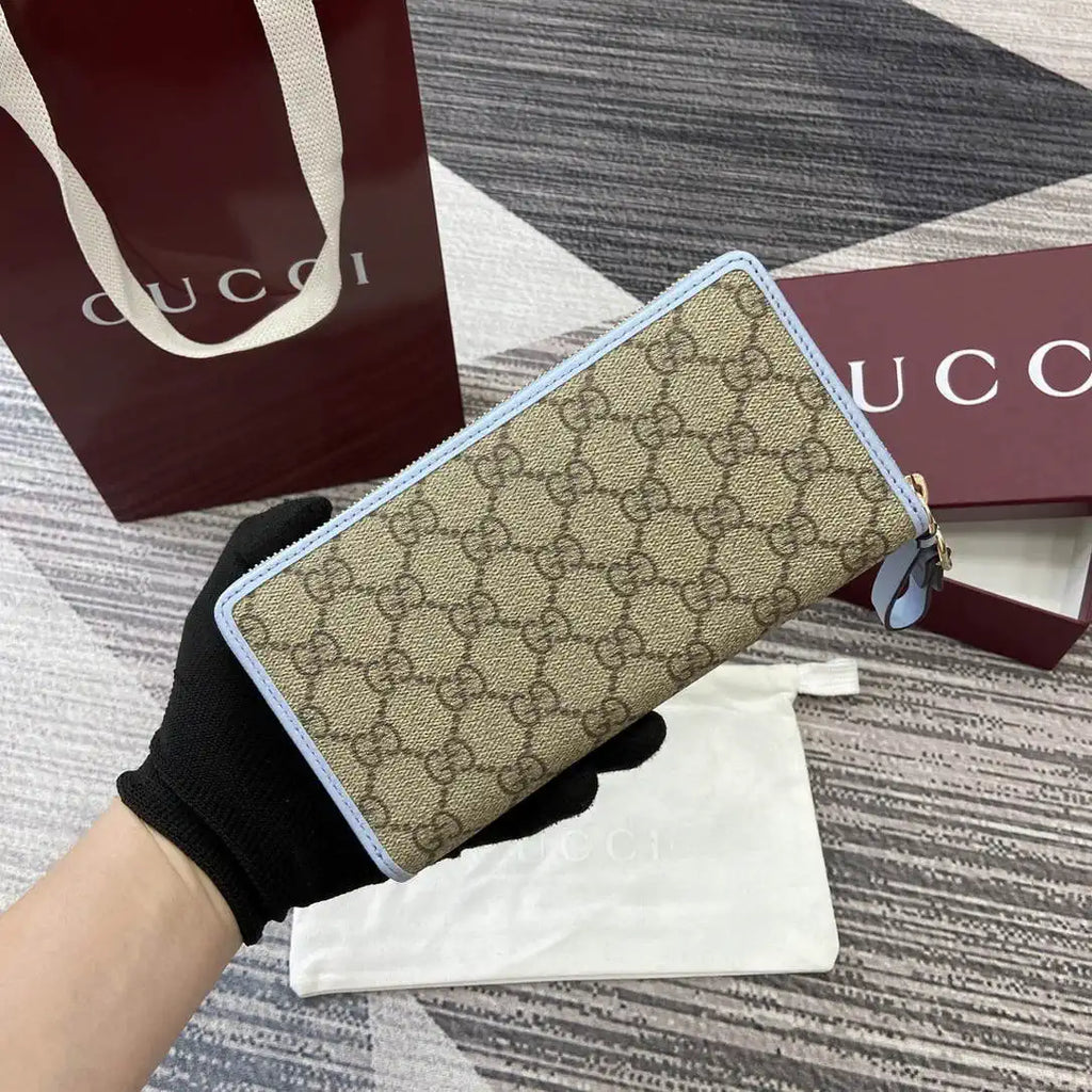 Gucci GG Emblem zip around wallet 819122 light blue