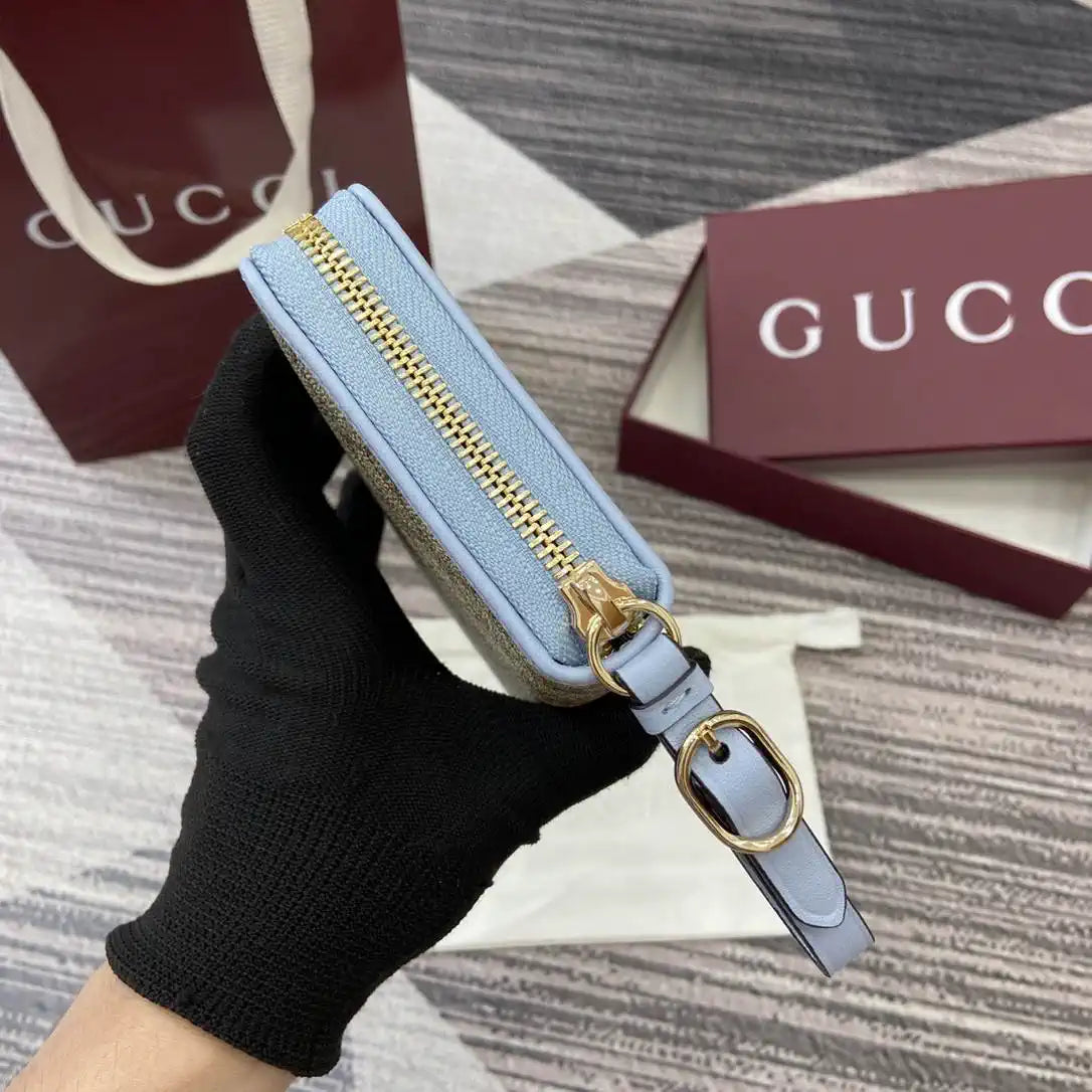 Gucci GG Emblem zip around wallet 819122 light blue