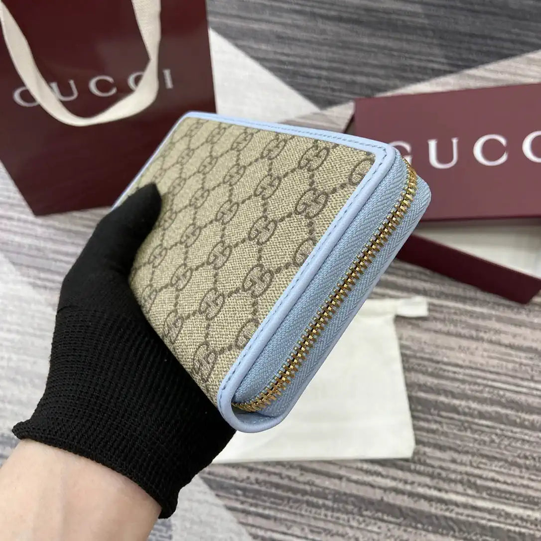 Gucci GG Emblem zip around wallet 819122 light blue