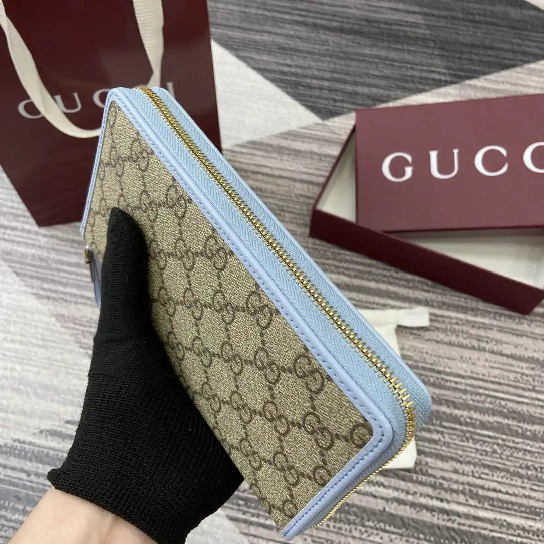 Gucci GG Emblem zip around wallet 819122 light blue