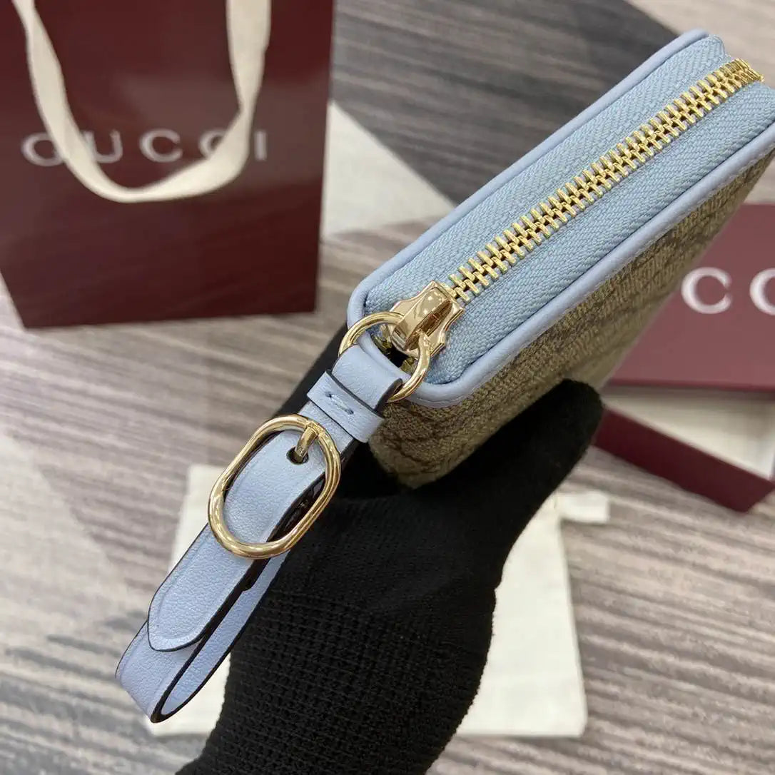 Gucci GG Emblem zip around wallet 819122 light blue