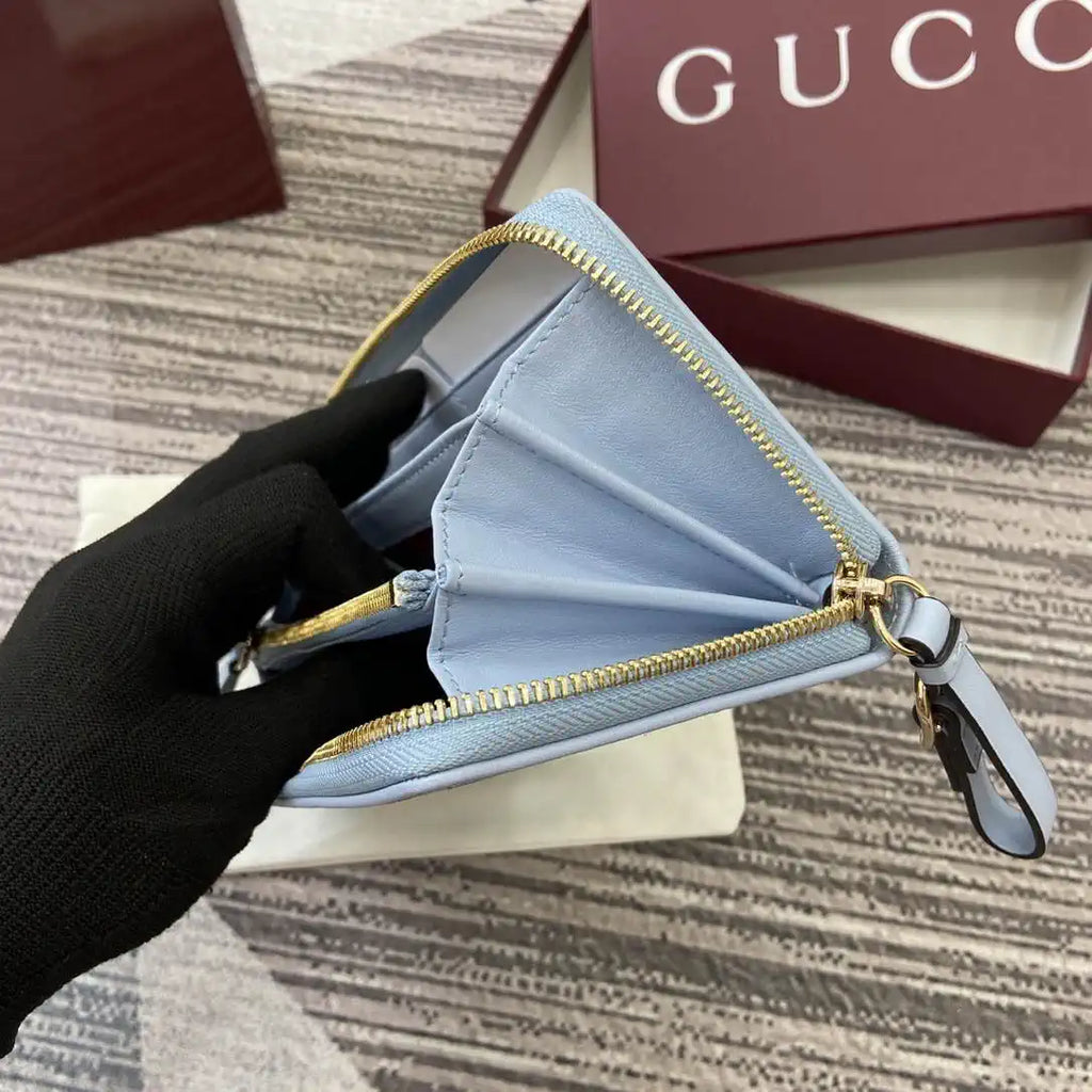 Gucci GG Emblem zip around wallet 819122 light blue