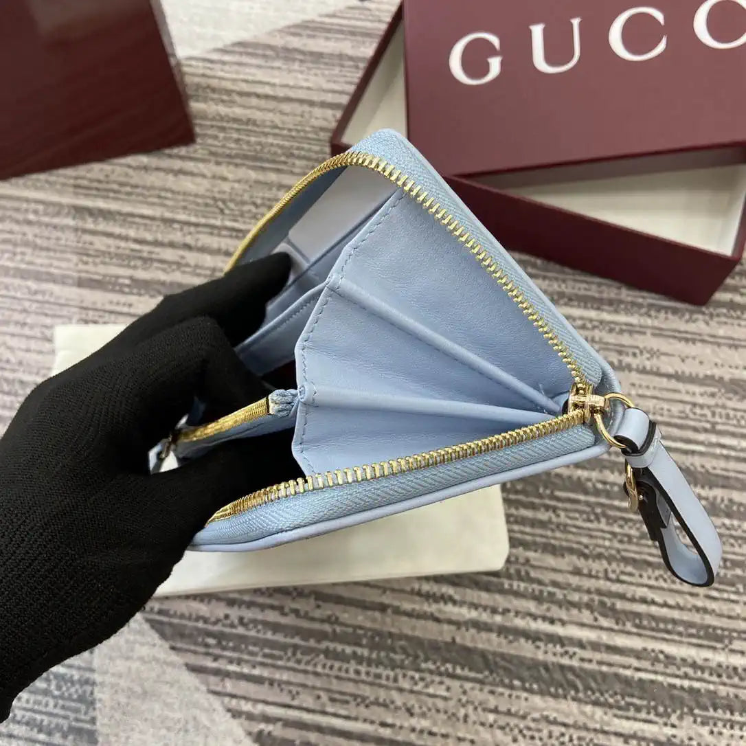 Gucci GG Emblem zip around wallet 819122 light blue