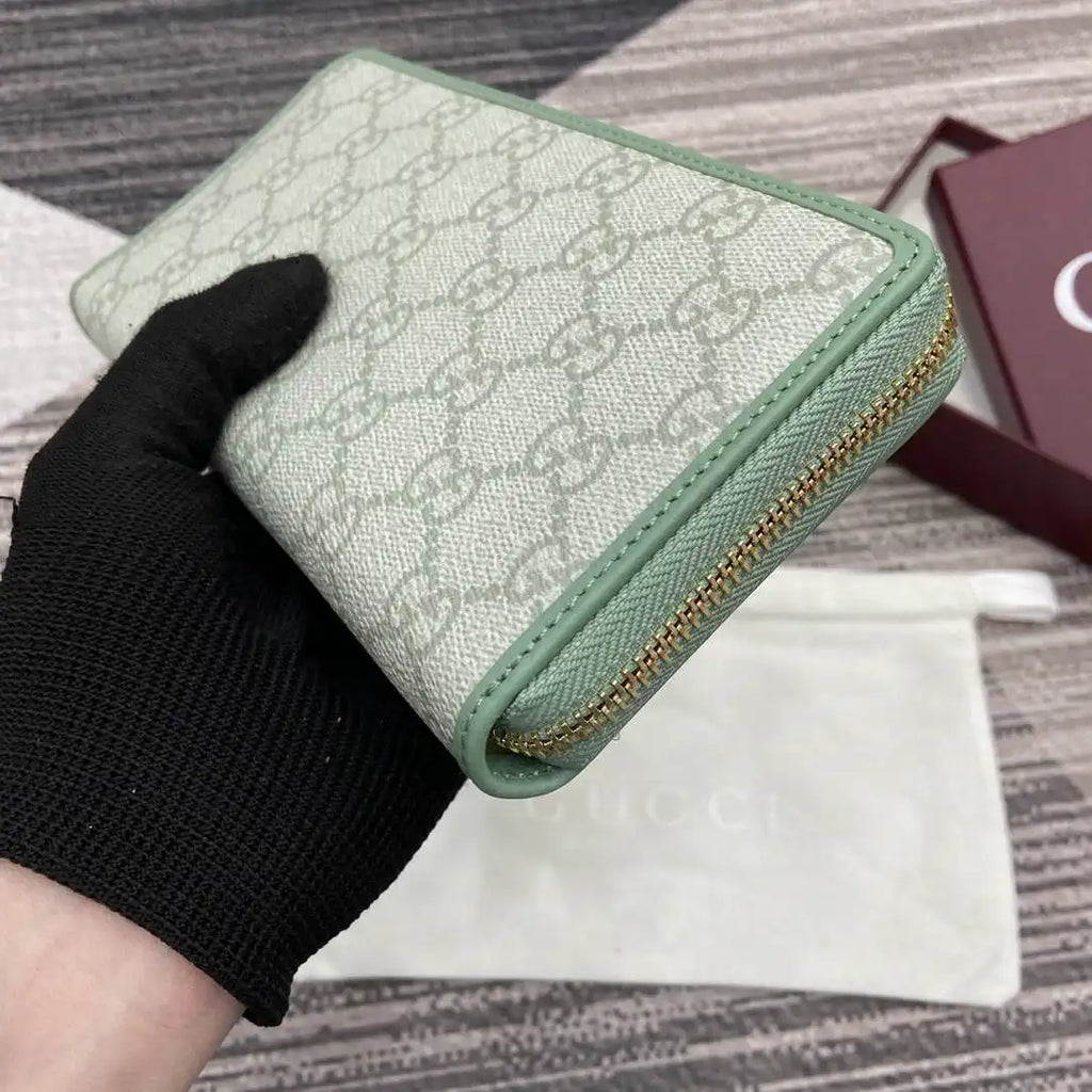Gucci GG Emblem zip around wallet 819122 green