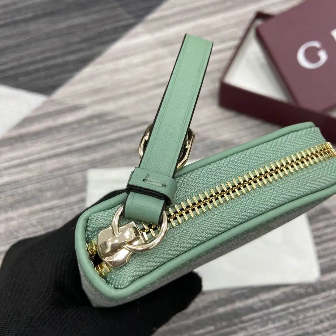 Gucci GG Emblem zip around wallet 819122 green