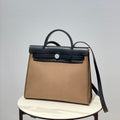 Hermes H082835CKAC Herbag Zip 31 Bag in Black Hunter Leather and Canvas H60031 - Default Title - View 1