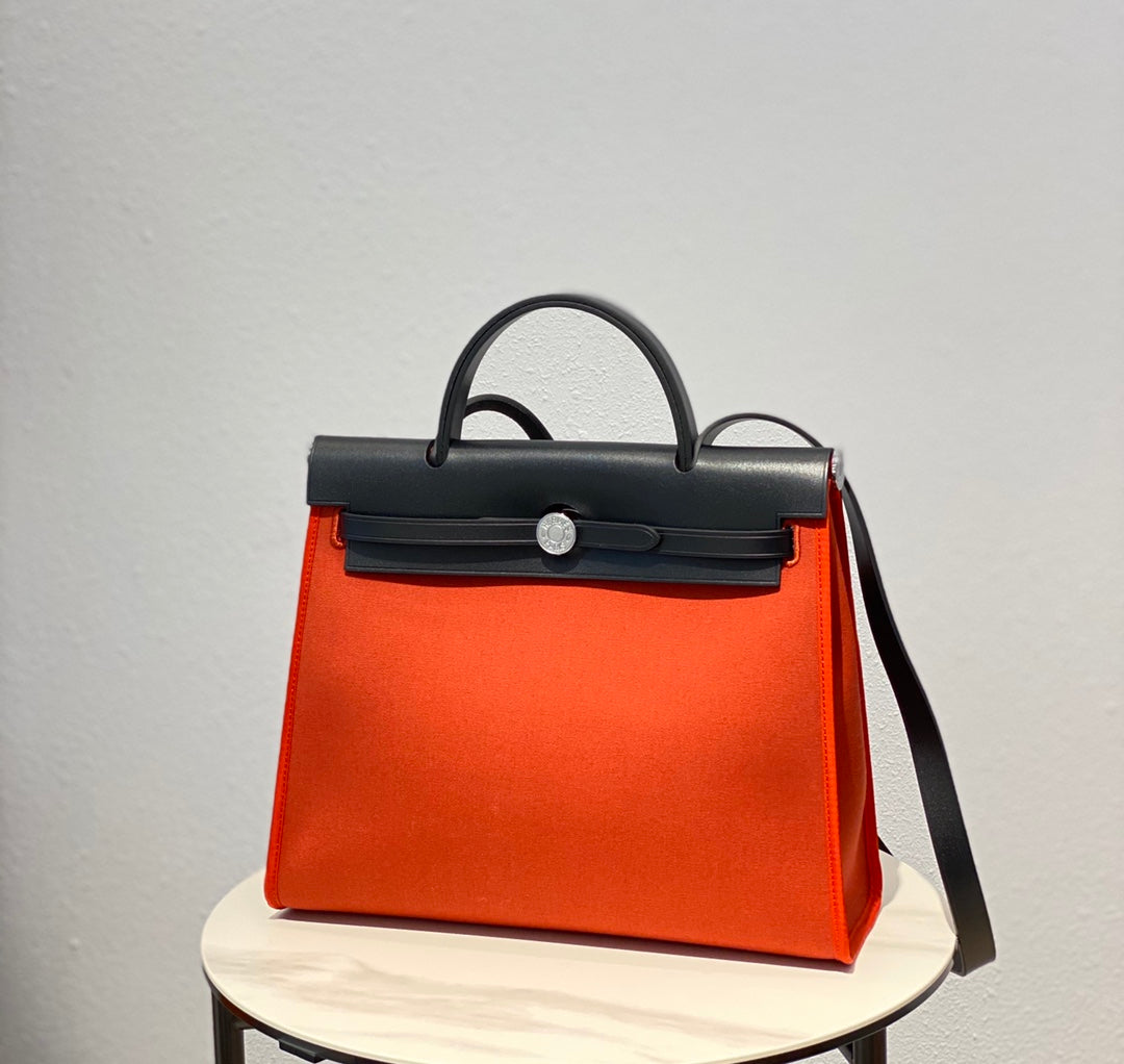 Hermes H082835CKAC Herbag Zip 31 Bag in Black Hunter Leather and Canvas H60033 - Default Title - View 1