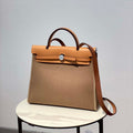 Hermes H082835CKAC Herbag Zip 31 Bag in Black Hunter Leather and Canvas H60036 - Default Title - View 1