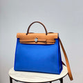 Hermes H082835CKAC Herbag Zip 31 Bag in Black Hunter Leather and Canvas H60040 - Default Title - View 1