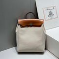 Hermes H084076CKAD A Dos Zip Retourne Herbag Backpack Toile Vache Hunter Ebene H60065