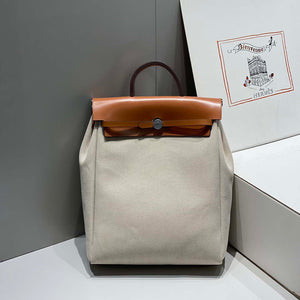 Hermes H084076CKAD A Dos Zip Retourne Herbag Backpack Toile Vache Hunter Ebene H60065 - Default Title - View 1