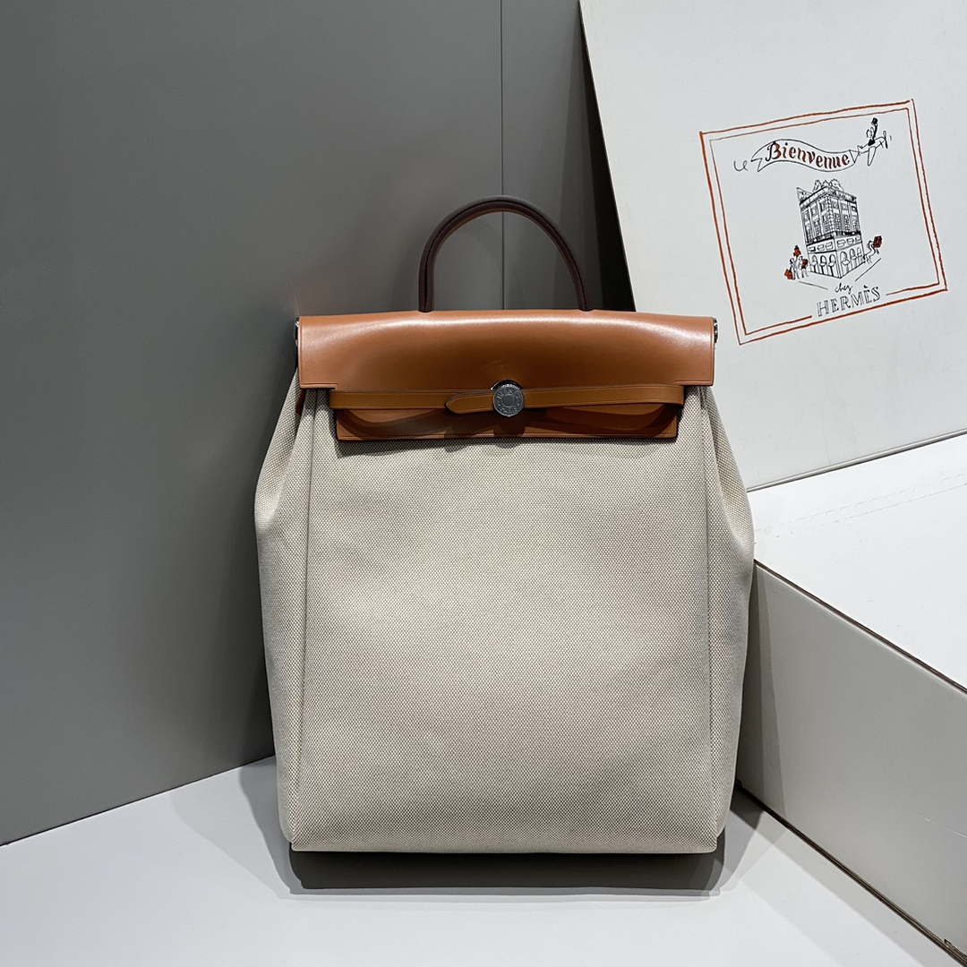Hermes H084076CKAD A Dos Zip Retourne Herbag Backpack Toile Vache Hunter Ebene H60065