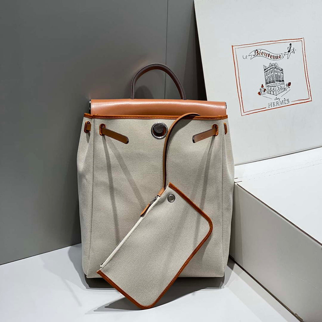 Hermes H084076CKAD A Dos Zip Retourne Herbag Backpack Toile Vache Hunter Ebene H60065