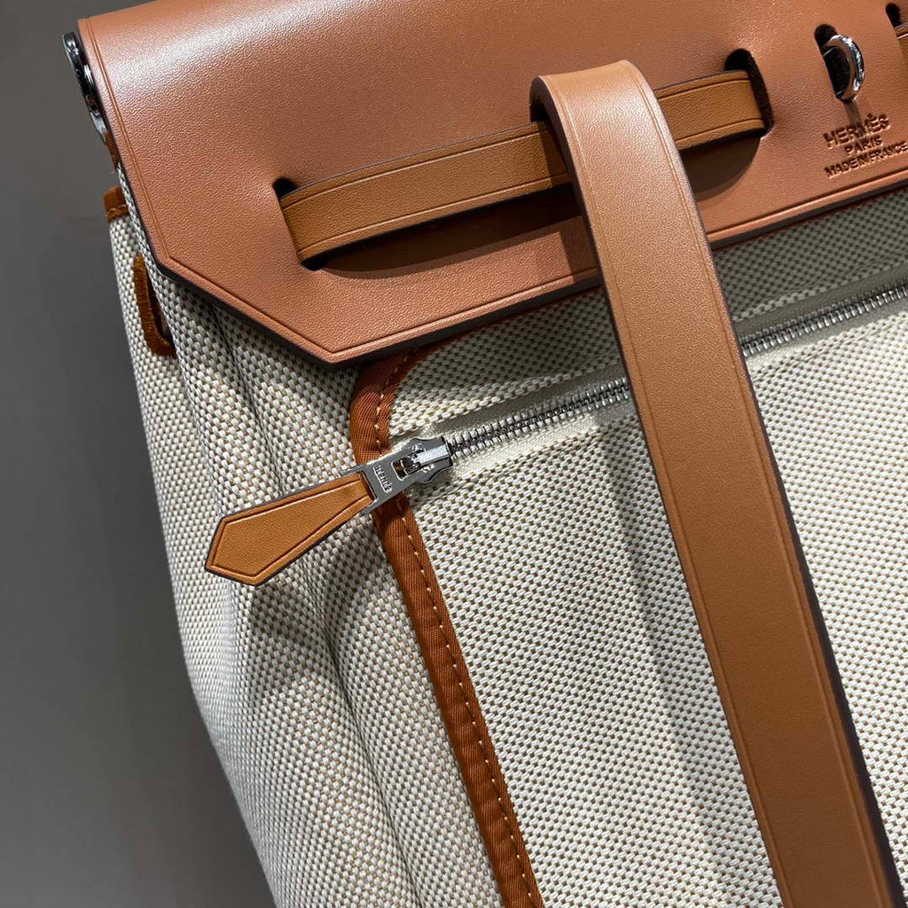 Hermes H084076CKAD A Dos Zip Retourne Herbag Backpack Toile Vache Hunter Ebene H60065