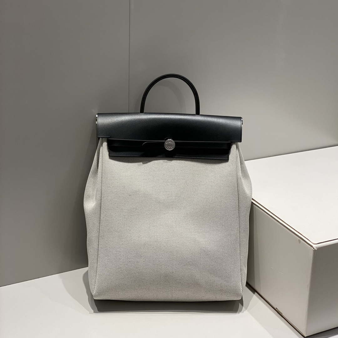 Hermes H084076CKAD A Dos Zip Retourne Herbag Backpack Toile Vache Hunter Ebene H60066