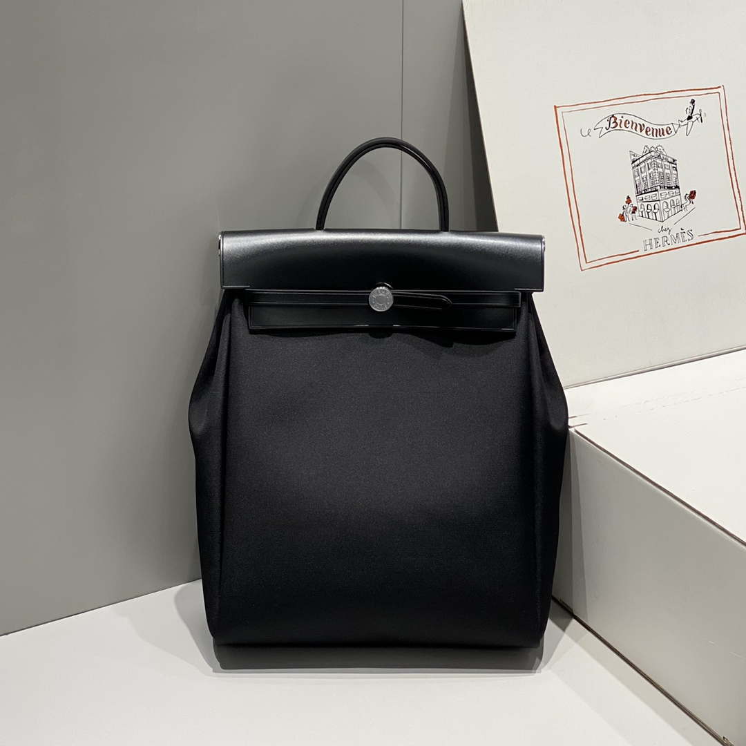 Hermes H084076CKAD A Dos Zip Retourne Herbag Backpack Toile Vache Hunter Ebene H60068 - Default Title - View 1