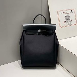 Hermes H084076CKAD A Dos Zip Retourne Herbag Backpack Toile Vache Hunter Ebene H60068 - Default Title - View 1