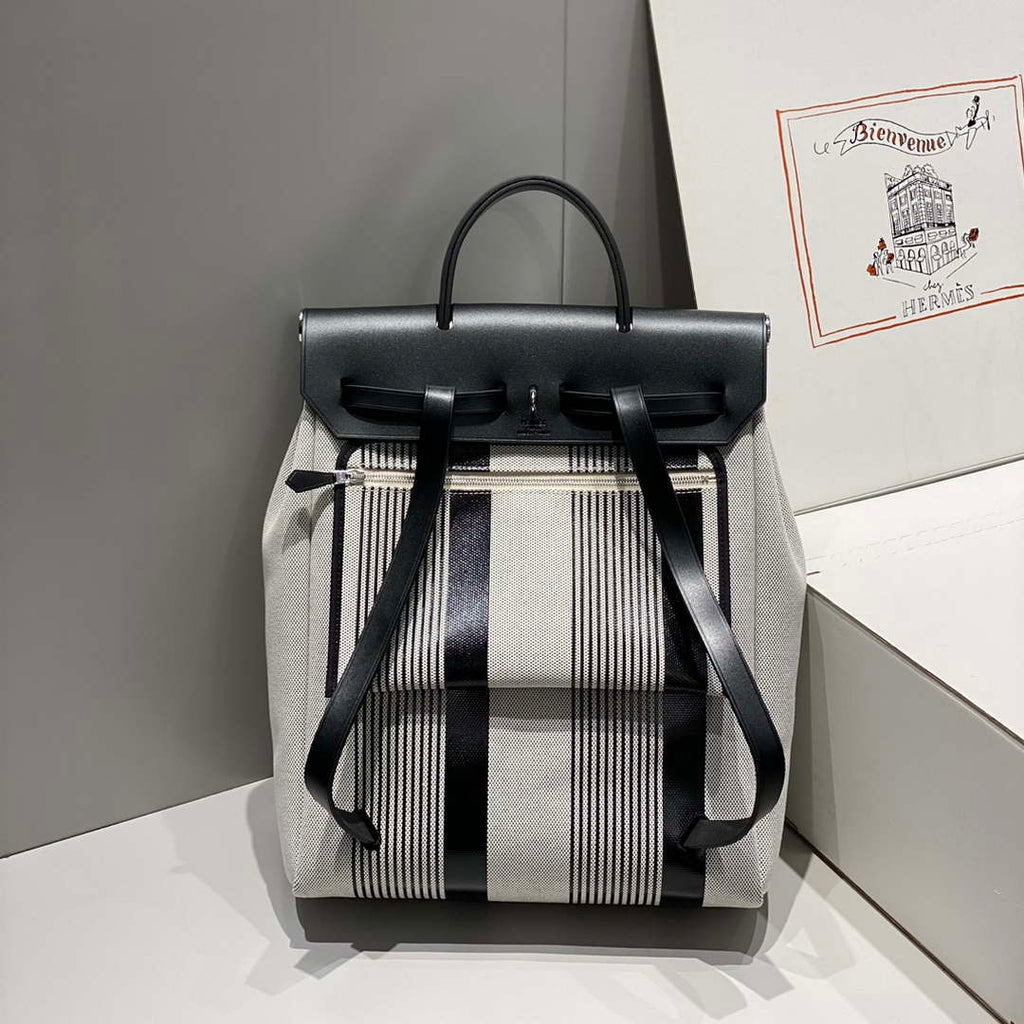 Hermes H084076CKAD A Dos Zip Retourne Herbag Backpack Toile Vache Hunter Ebene H60070
