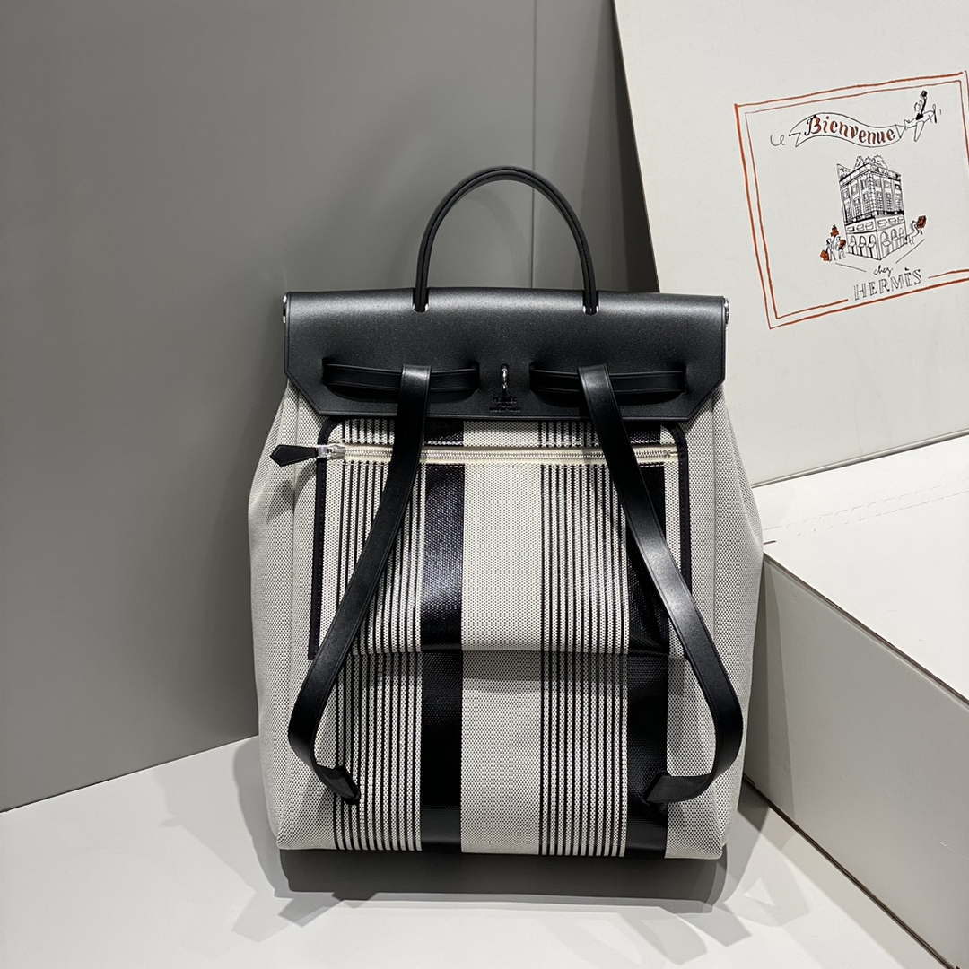 Hermes H084076CKAD A Dos Zip Retourne Herbag Backpack Toile Vache Hunter Ebene H60070