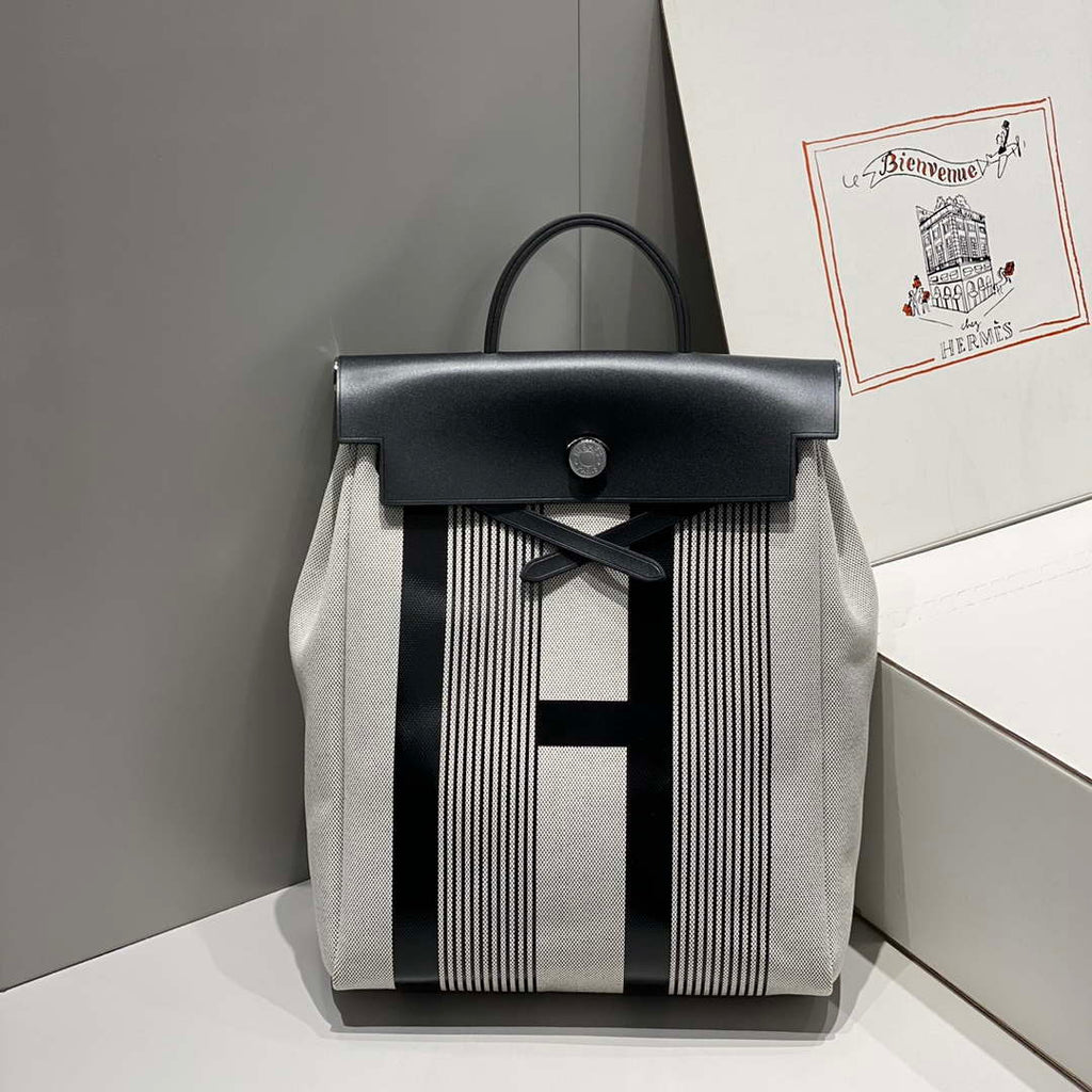 Hermes H084076CKAD A Dos Zip Retourne Herbag Backpack Toile Vache Hunter Ebene H60070