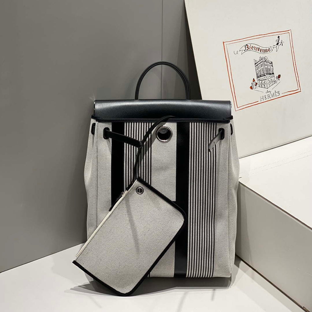 Hermes H084076CKAD A Dos Zip Retourne Herbag Backpack Toile Vache Hunter Ebene H60070