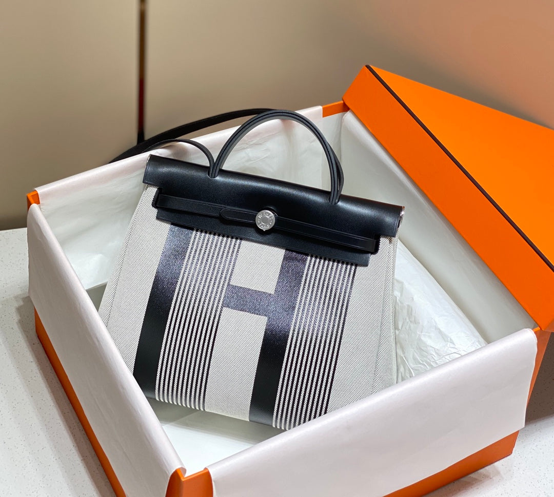 Hermes H084076CKAD Herbag Zip 31 Bag in Black Hunter Leather and Canvas H60047 - Default Title - View 1