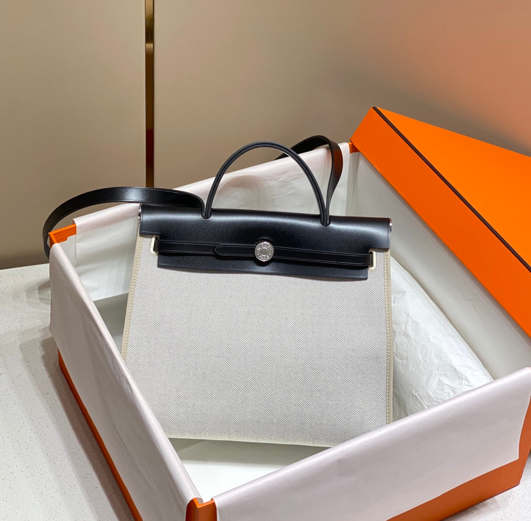Hermes H084076CKAD Herbag Zip 31 Bag in Black Hunter Leather and Canvas H60048 - Default Title - View 1