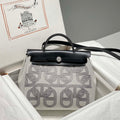 Hermes H084076CKAD Herbag Zip 31 Bag in Black Hunter Leather and Canvas H60062 - Default Title - View 1