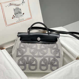 Hermes H084076CKAD Herbag Zip 31 Bag in Black Hunter Leather and Canvas H60062 - Default Title - View 1