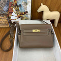 Hermes H084109CK25 Kelly Messager Shoulder Togo 25 bags Elephant Gray Gold