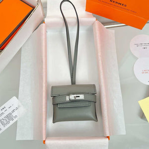 Hermes H084665CK0U Kellyfestival charm Kelly bag charm in Swift calfskin H88901 - Gold - View 1