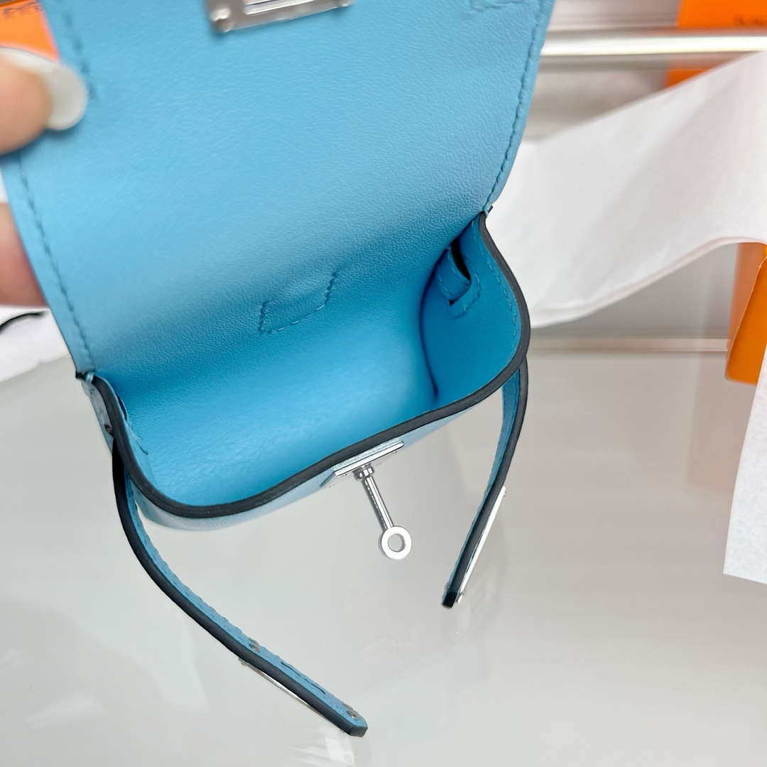 Hermes H084665CK0U Kellyfestival charm Kelly bag charm in Swift calfskin H88905